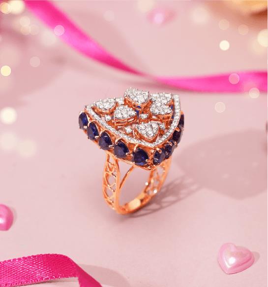 Diamond ring with blue gemstones in gold setting by Boffo Jewels